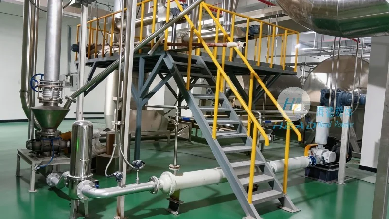 Solución de transporte neumático para polvo de lactosa