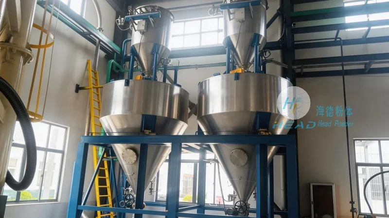 Solución de transporte neumático de partículas portadoras de alimentos de plástico
